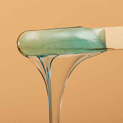 Close-up of smooth clear wax texture