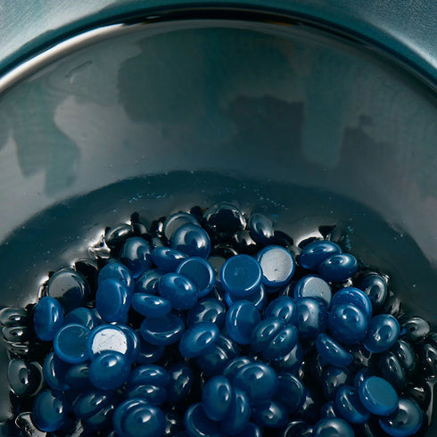 Close-up view of hard wax beads texture